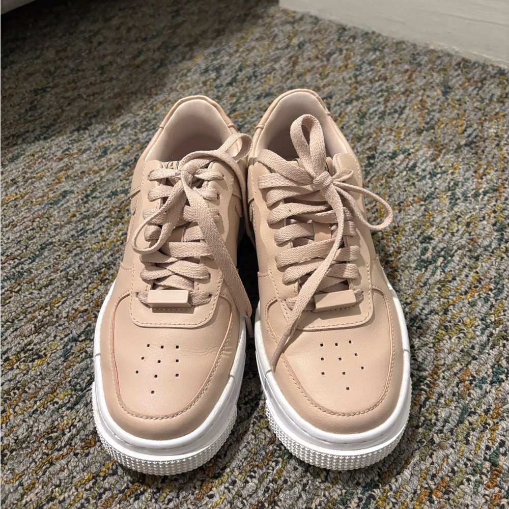 Nike Tan Sneakers with Platform Sole and Lace-Up Design